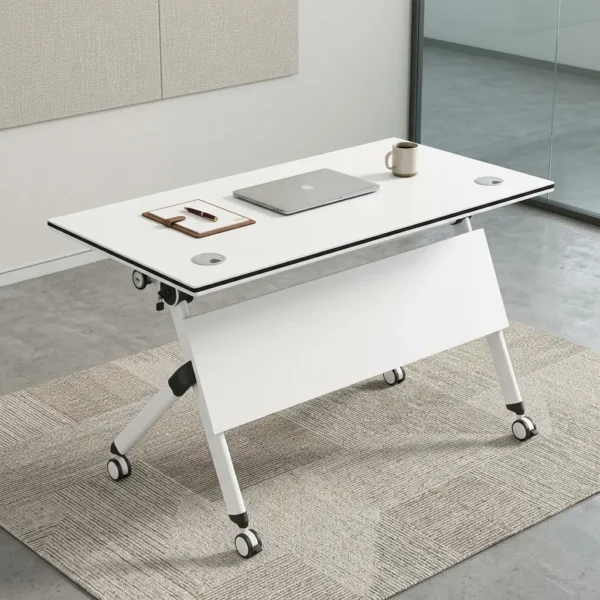 White Mobile Folding Training Table with a laptop and documents on top, resting on a textured geometric blue rug.